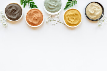 Clay mud cosmetic mask in bowl for spa beauty treatment
