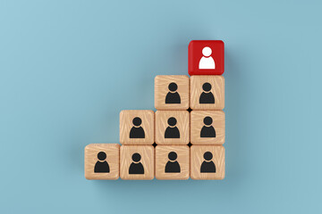 Pyramid stairs of wooden blocks with people icons. Top red block leader. 3D rendering. Human resource development and teamwork concept