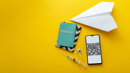 Green passports coronavirus Qr code on smartphone screen, Vaccine syringe covid 19, paper plane. Digital PCR certificate Corona vaccine pass. Free traveling international. Long web banner copy space.