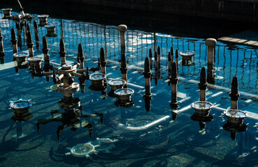 metal pipes of city fountains