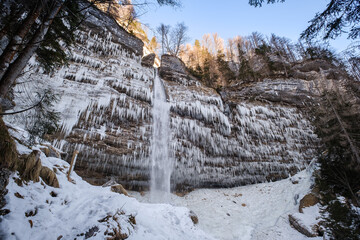 Frozen Pericnik waterfall in Vrata valley in Slovenia