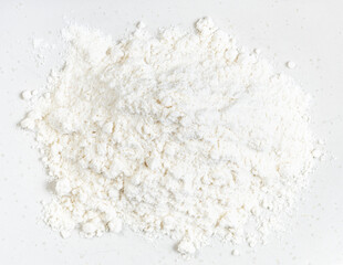 top view of pile of wheat flour close up on gray