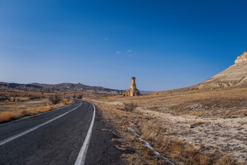 cliffs and rock formations along Zelve Yolu near Cavusin, Nevsehir Province, Turkey. February 2021