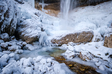 Frozen Pericnik waterfall in Vrata valley in Slovenia