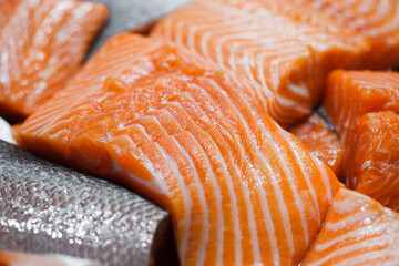 Salmon fish, cut pieces in bulk at fish market