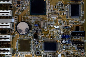 The chip of the computer's motherboard. Macro photo. Details of the chip and chips. High technology