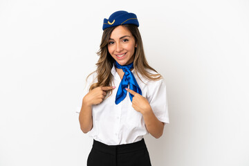 Airplane stewardess over isolated white background with surprise facial expression
