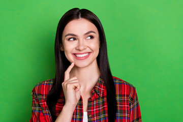 Photo of sweet straight hair young lady look empty space finger face wear red shirt isolated on green color background