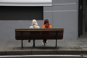 Couple sitting on bench