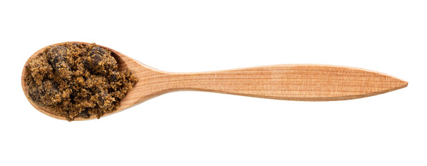top view of muscovado cane sugar in spoon isolated