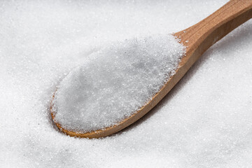 above view of spoon with crystalline erythritol