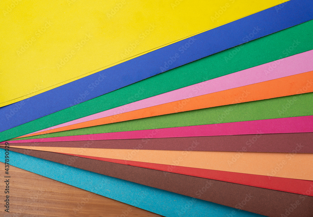 Poster multi color card board making colorful background on table