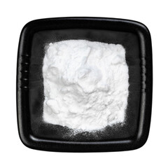view of sodium bicarbonate in black bowl isolated