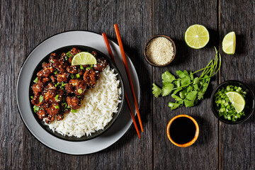 Cauliflower wings with rice on a bowl, close-up