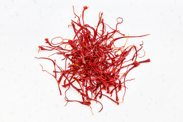 pile of crocus saffron threads close up on gray