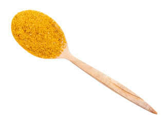 top view of ground dried tagetes in wood spoon