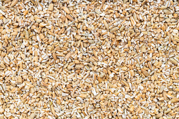 background - crushed rye groats grains