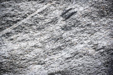 Stone material wall texture on a large canvas with small color details and lots of space