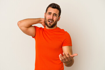 Young caucasian man isolated on white background screaming with rage.