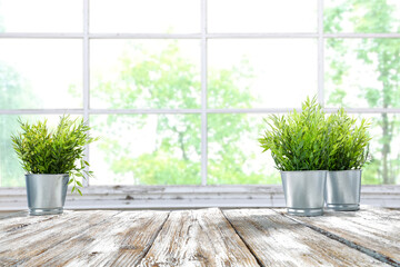Table background of free space and blurred background of window 