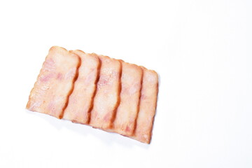 fried pork bacon slice arranging on white background