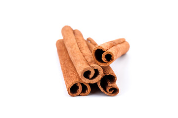 Fragrant cinnamon sticks isolated on white background
