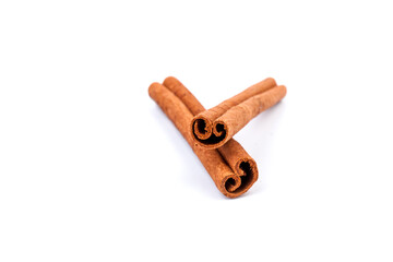 Fragrant cinnamon sticks isolated on white background
