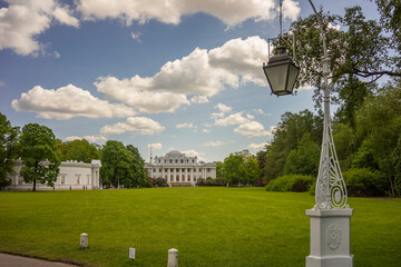 Landscape with a view of the meadow and the Elaginoostrovsky Palace Museum on a sunny day in St....