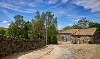 Hardcore filling and levelling for tarmac on driveway by traditional North Yorkshire barn