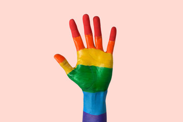 raised hand painted as the rainbow flag