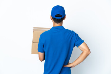 Delivery Chinese man isolated on white background in back position