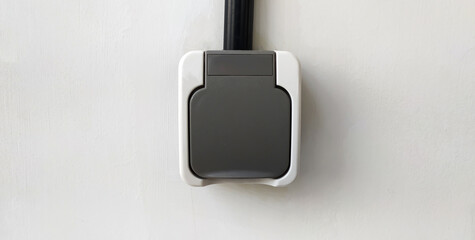 Light switch on a white wall background. isolated light switch.