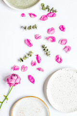 woman table with rose flower top view white background space for text