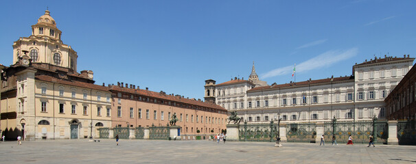 gate of the Royal Palace, statues of the Dioscuri, church and dome  of San Lorenzo and Palazzo Reale in Piazza Castello.