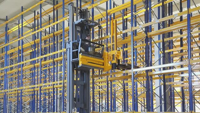 High Rack Stacker Forklift and Shelving System in New Warehouse