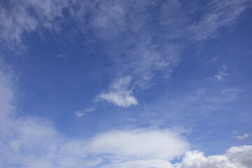 Clouds and blue sky in sunny weather without wind, summer outside, the weather is very warm for walks and picnics