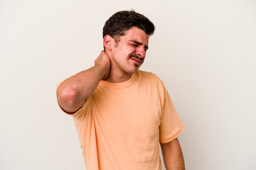 Obraz premium Young caucasian man isolated on white background having a neck pain due to stress, massaging and touching it with hand.