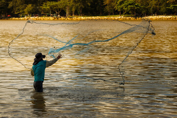 fisherman, fisherman fishing in the sea