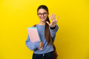 Student kid woman over isolated yellow background counting five with fingers