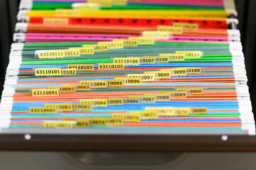 Close up of documents file in file cabinet background