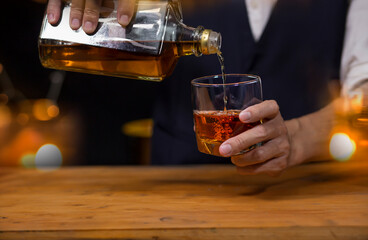 Bartender Serve Whiskey, on wood bar, 