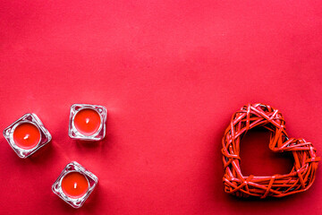 scarlet collection with candles red colored background top view space for text