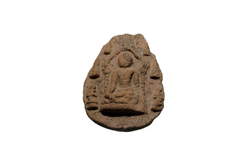 Ancient votive tablet, the Buddha seated in Subduing Mara gesture beneath the Mahabodhi Sikhara of Budh Gaya with his two disciples, isolated on white background.