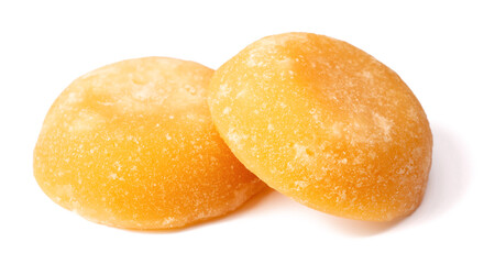 two cakes of palm sugar isolated on white background