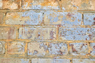 Fototapeta premium A fragment of a brick wall. The texture of the stone.