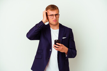 Young business man holding a phone isolated on white background
