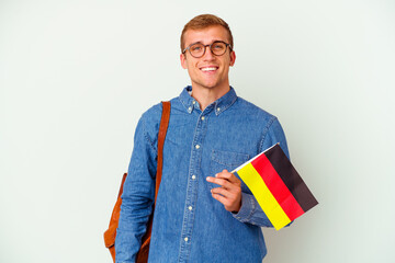 Young student caucasian man studying german isolated on white background