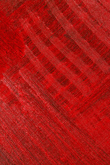 abstract creative background: red stain of colored primer when toning the canvas, temporary object.