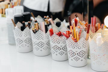 Close-up makeup brushes in a beauty salon.