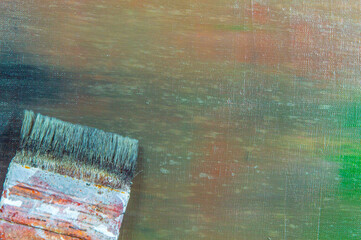 abstract colored creative background - rough linen canvas unevenly covered with multi-colored...